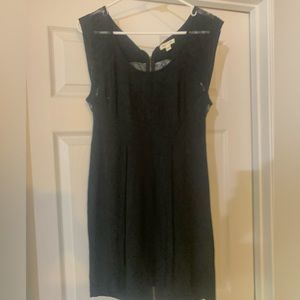 Black dress with lace and zipper down back. Size 6